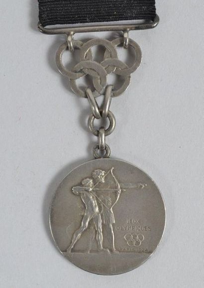 null PARIS 1924. Médaille avec son ruban à l'effigie du Tir à l'arc. Gravée

"Jeux...