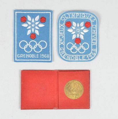 null GRENOBLE 1968. Set with a gold metal participant pin (14x19 mm).

2 official...