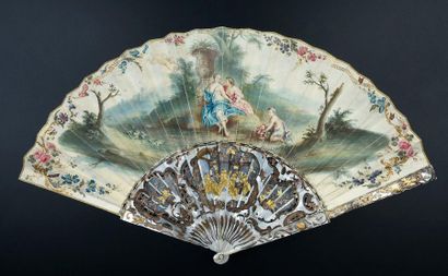 null Flora in his garden, circa 1750-1760
Folded fan, the leaf in skin, mounted in...