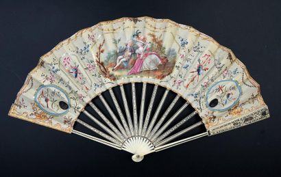 null Two fans, circa 1770-1780 *One, cream silk leaf painted with two maritime views....
