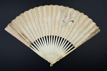 null Two Chinese, circa 1770
Folded fan, the double sheet of paper engraved and painted...