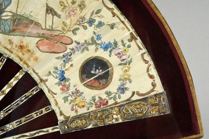 null Chinese garden, circa 1770-1780
Folded fan, the cream silk leaf painted with...