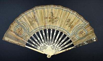 null The visit of the peddler, circa 1780-1790
Folded fan, the silk leaf embroidered...