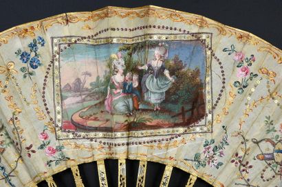 null Regional costume, circa 1770-1780
Folded fan, silk leaf painted with musical...