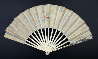 null The Muses, circa 1790
Fan, the silk leaf painted and embellished with golden...