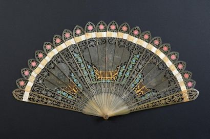 null Baskets of flowers, circa 1820
A very finely pierced horn fan of the broken...