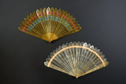 null Two fans, circa 1830
Of the broken type in pierced horn.
One painted with a...