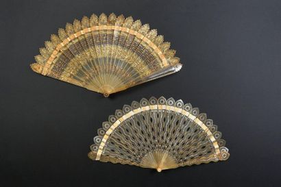 null Two fans, circa 1830
, of the broken horn type. One with serpentine strands...