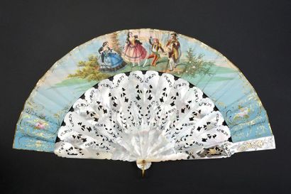 null Two fans, circa 1850 *the first showing an interior lit by candles where a young...