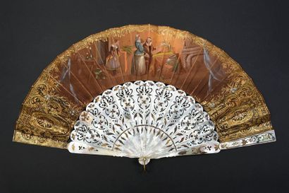 null Two fans, circa 1850 *the first showing an interior lit by candles where a young...