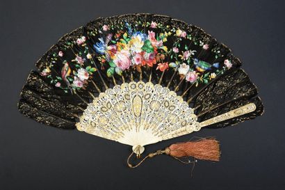null Roses and birds, circa 1860
Fan, in the taste of Chinese fans, composed of black...