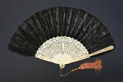 null Roses and birds, circa 1860
Fan, in the taste of Chinese fans, composed of black...