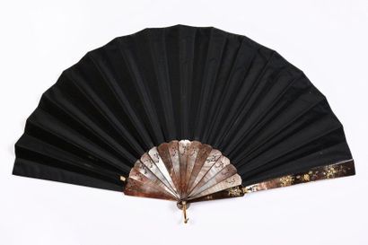 null Chinese entertainment, ca. 1890-1900
Folded fan, black satin leaf painted with...