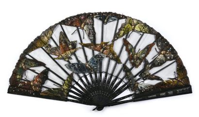 null Moths, circa 1890
Large folded fan, the black tulle leaf decorated with large...