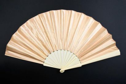 null Sunset sun, circa 1890
Large cream satin fan painted with an exotic panorama...