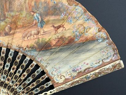 null The young shepherd, circa 1900
Folded fan, the sheet in skin, mounted in the...