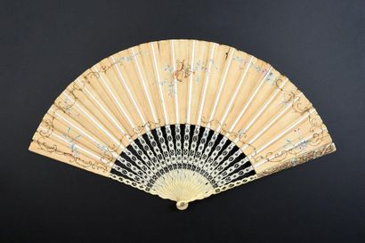 null The young shepherd, circa 1900
Folded fan, the sheet in skin, mounted in the...