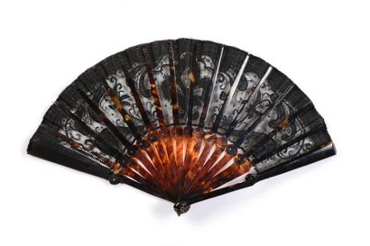 null Pocket fan, circa 1900-1920
Folding or pocket fan. The black tulle leaf embroidered...
