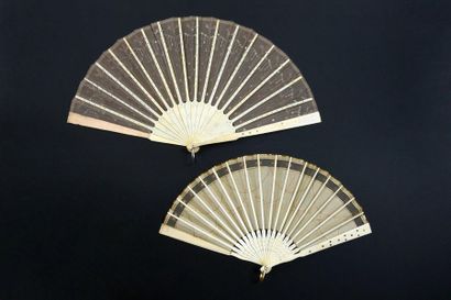 null Sequins, circa 1930
Two fans, the leaves decorated with sequins.
Bone frames.
One...