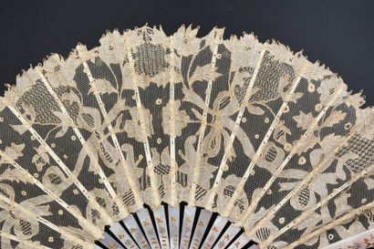 null Symmetrical bouquets, circa 1900
Folded fan, lace leaf, Carrickmacross type,...