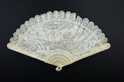 null The rough sea, China, circa 1840
Rare broken ivory* fan finely pierced and carved...