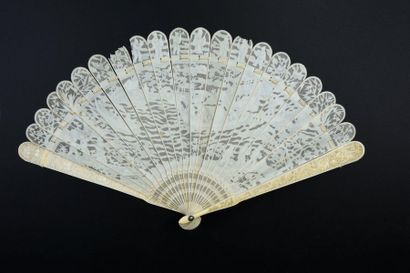 null The rough sea, China, circa 1840
Rare broken ivory* fan finely pierced and carved...