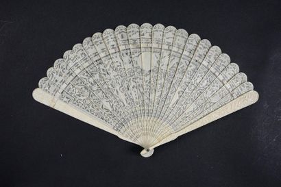 null Dragon and birds, China, early 19th century
Ivory* broken type fan, pierced...