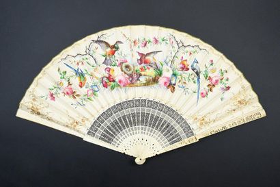 null Birds and the nest, circa 1860
Folded fan, the painted skin leaf of birds around...