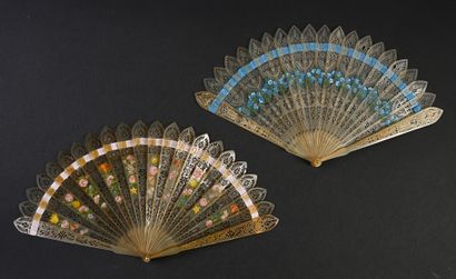 null Two fans, circa 1820 *One of the broken type in horn pierced and painted on...