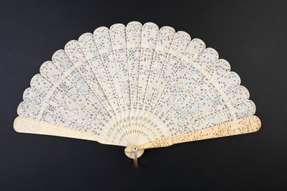 null Chinese gardens, China, 19th century
Broken type fan made of pierced bone, and...
