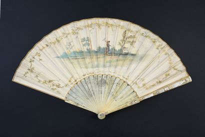 null Picnic, circa 1720
Folded fan, the leaf in skin, mounted in English style, and...