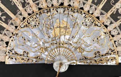 null The newlyweds, circa 1890
Folded fan, the leaf in beige lace, with symmetrical...
