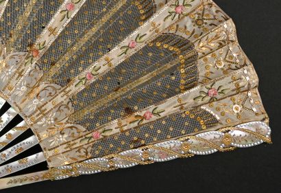 null Roses in ribbons, circa 1900
Folded fan, the cream silk leaf embroidered with...