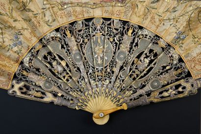 null The pretty singer, circa 1780
Folded fan, the silk leaf painted with foliage...