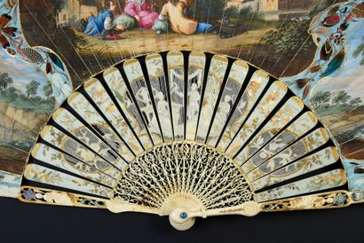 null Feathers and straw, circa 1760
Very refined folded fan, the leaf in skin, mounted...