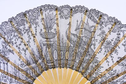 null The peacock, circa 1890-1900
Folded fan, the black bobbin lace leaf with the...