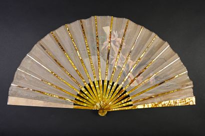 null The heat of love, circa 1890
Large folded fan, the leaf made of brown tinted...