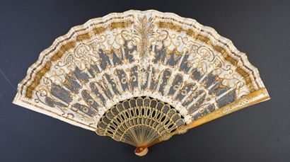 null Wheat sheaf, circa 1900
Folded fan, the silk and tulle leaf embroidered with...