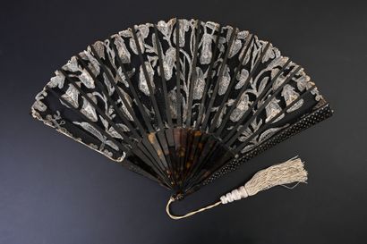 null Digitals, circa 1900
Folded fan, the double sheet of black tulle decorated with...