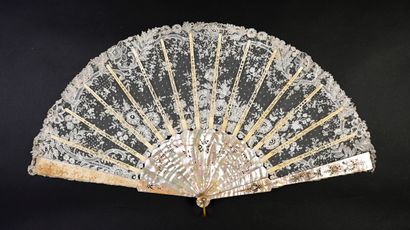 null Flowering groves, circa 1890
Folded fan, the leaf in bobbin lace drawing under...