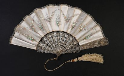 null Silver filigree, circa 1880
Folded fan, the cream silk leaf painted with five...