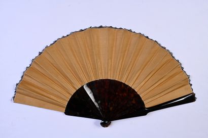 null Four-leaf clovers, circa 1880
Folded fan, the cream satin leaf bordered in the...