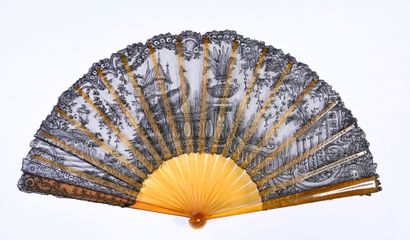 null The peacock, circa 1890-1900
Folded fan, the black bobbin lace leaf with the...