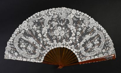 null Roses in bouquets and diamonds, circa 1890
Large lace fan, with spindles drawing...