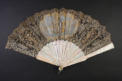null The music lesson, circa 1860
Folded fan, the leaf in bobbin lace drawing a frame...