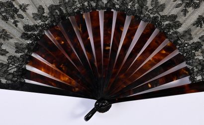 null Volutes and bouquets, circa 1890
Large folded fan, the leaf in black bobbin...