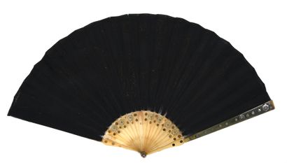 null The fruits of autumn, circa 1820
Black silk gauze fan embroidered with a rich...