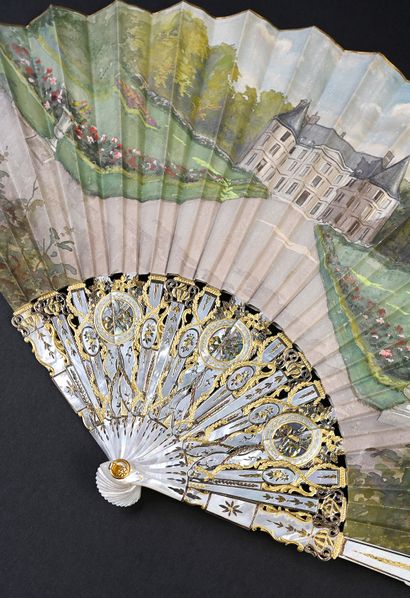 null A castle in France, circa 1920
Folded fan, the double cloth sheet painted with...