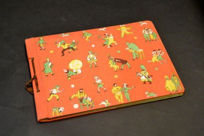 HERGÉ. THE TINTIN TINTIN CIGAR RINGS. Horizontal orange album, with scenes of Tintin...