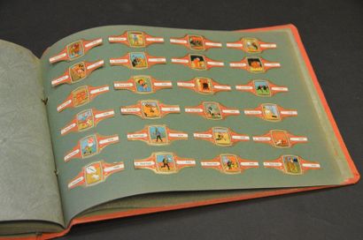 HERGÉ. LES BAGUES À CIGARES TINTIN Tintin. Album horizontal orange, avec scènes de...